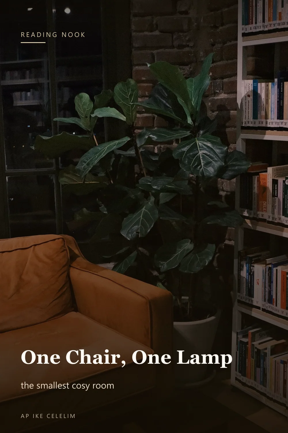 A small warm-lit reading corner with a chair, a lamp and a side table