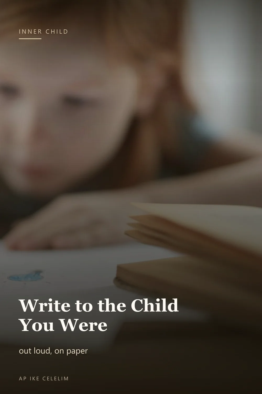 A child drawing on paper with markers