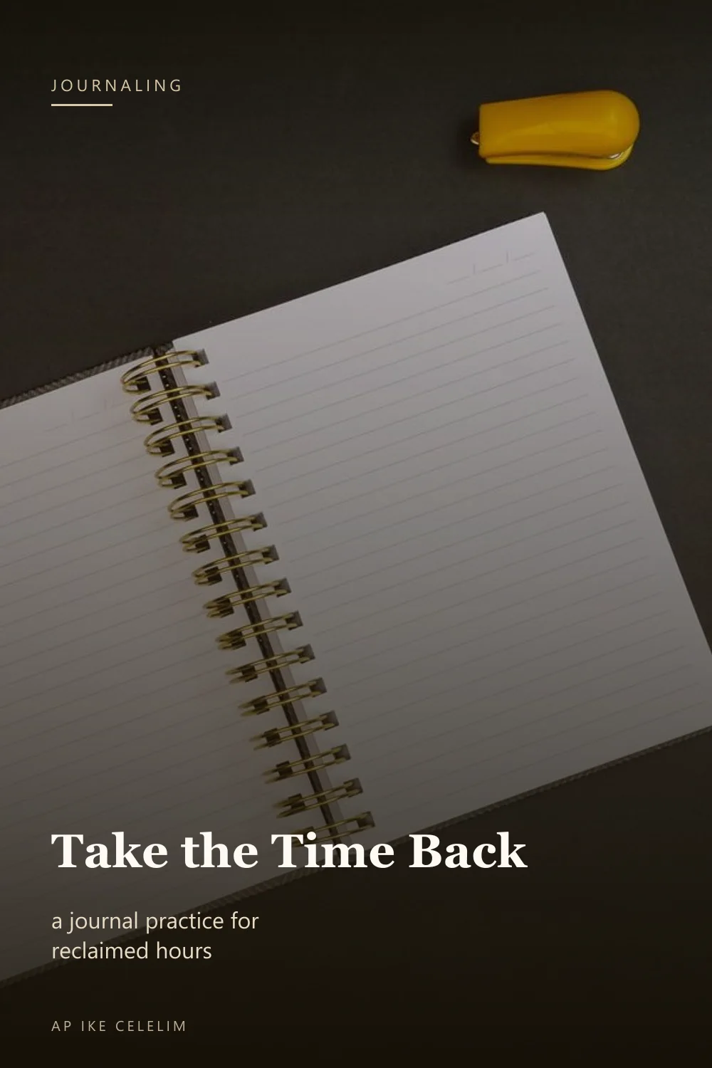 An open spiral notebook with pens and an eraser on a dark desk